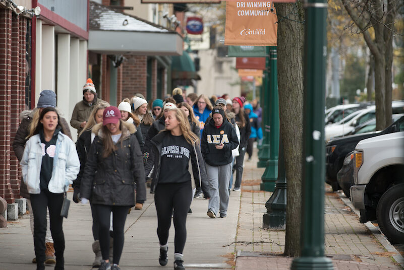 people walking on sidewalk