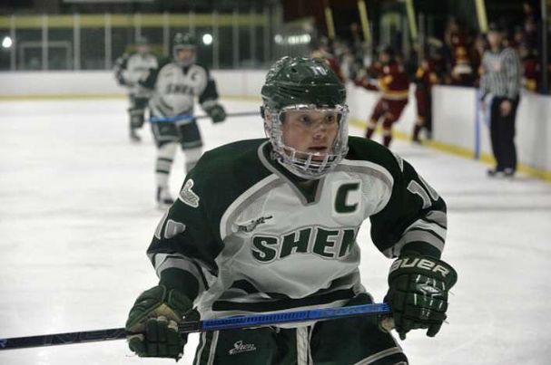 Cole Haldane playing for Shen high school varsity ice hockey team.