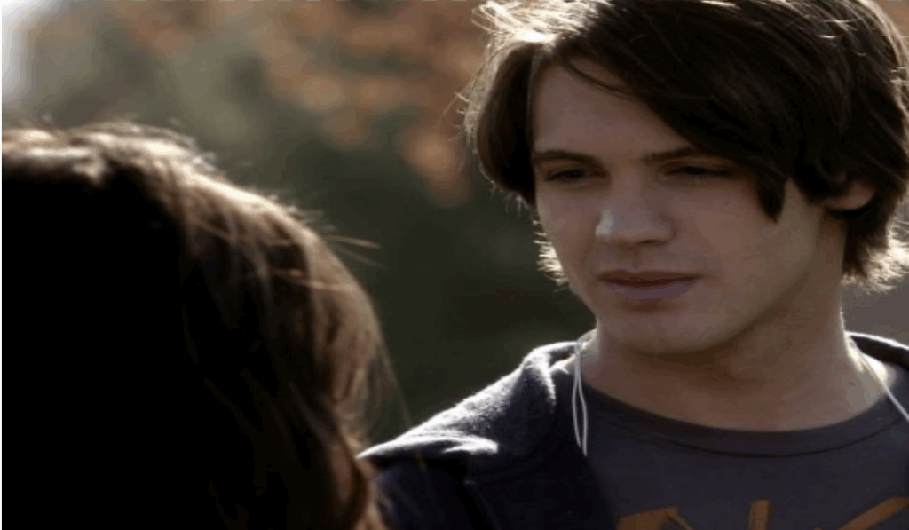 Elena and Jeremy Gilbert face off in a tense moment at school, daytime and public tension