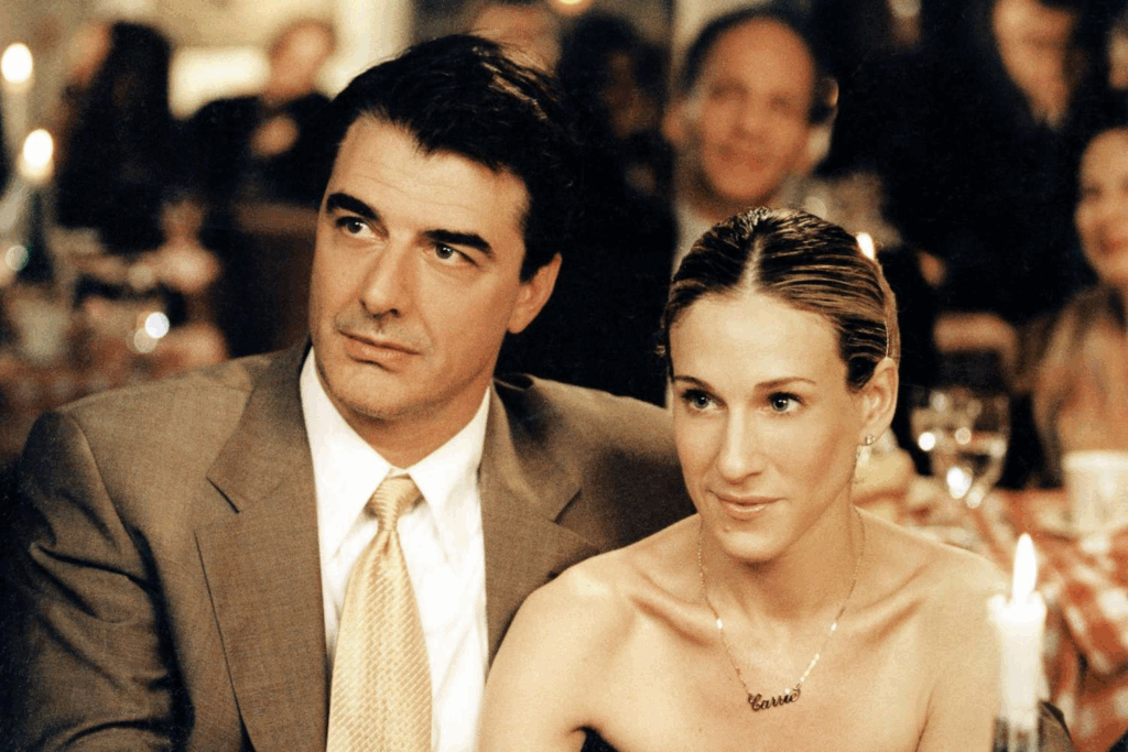 Close up portrait of Mr. Big and Carrie in a restaurant.