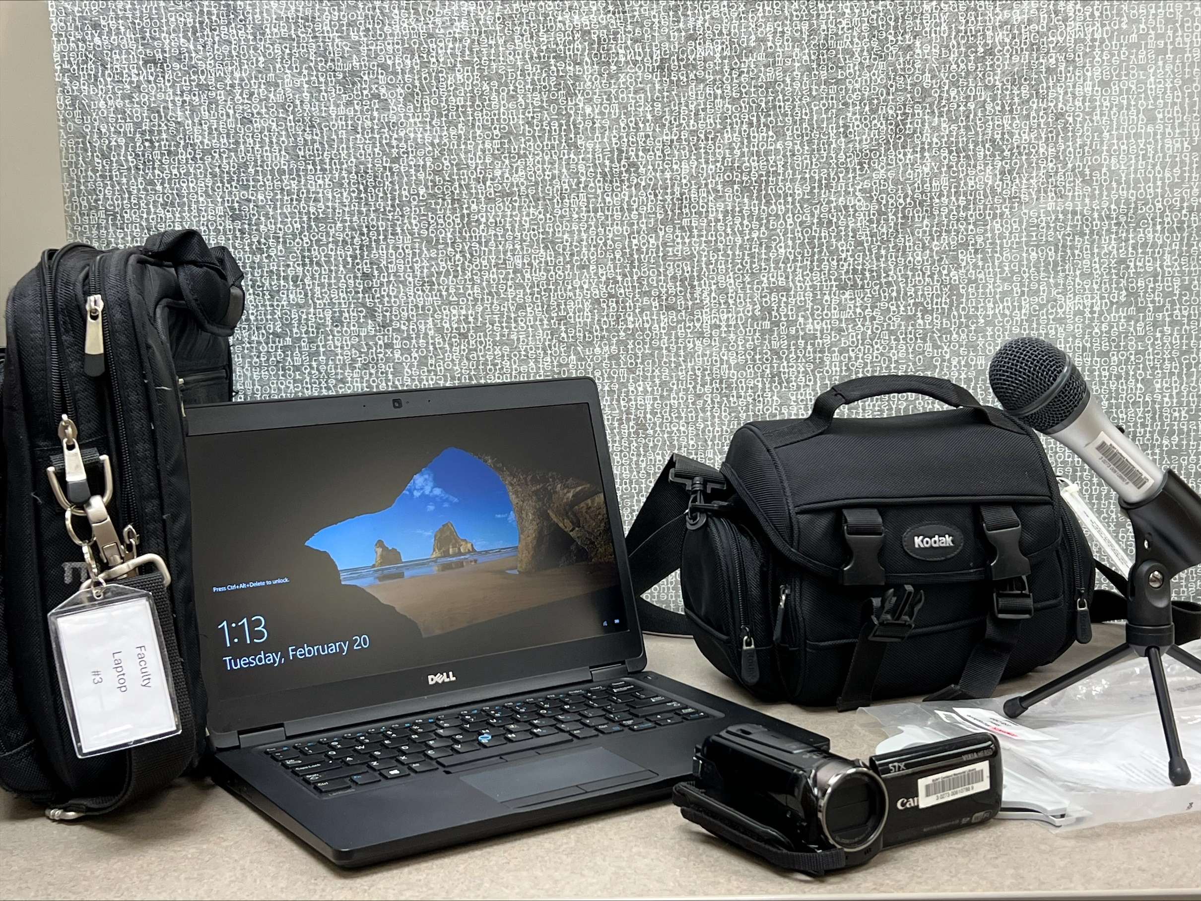 Image of various equipment available to loan - laptop, video camera and microphone