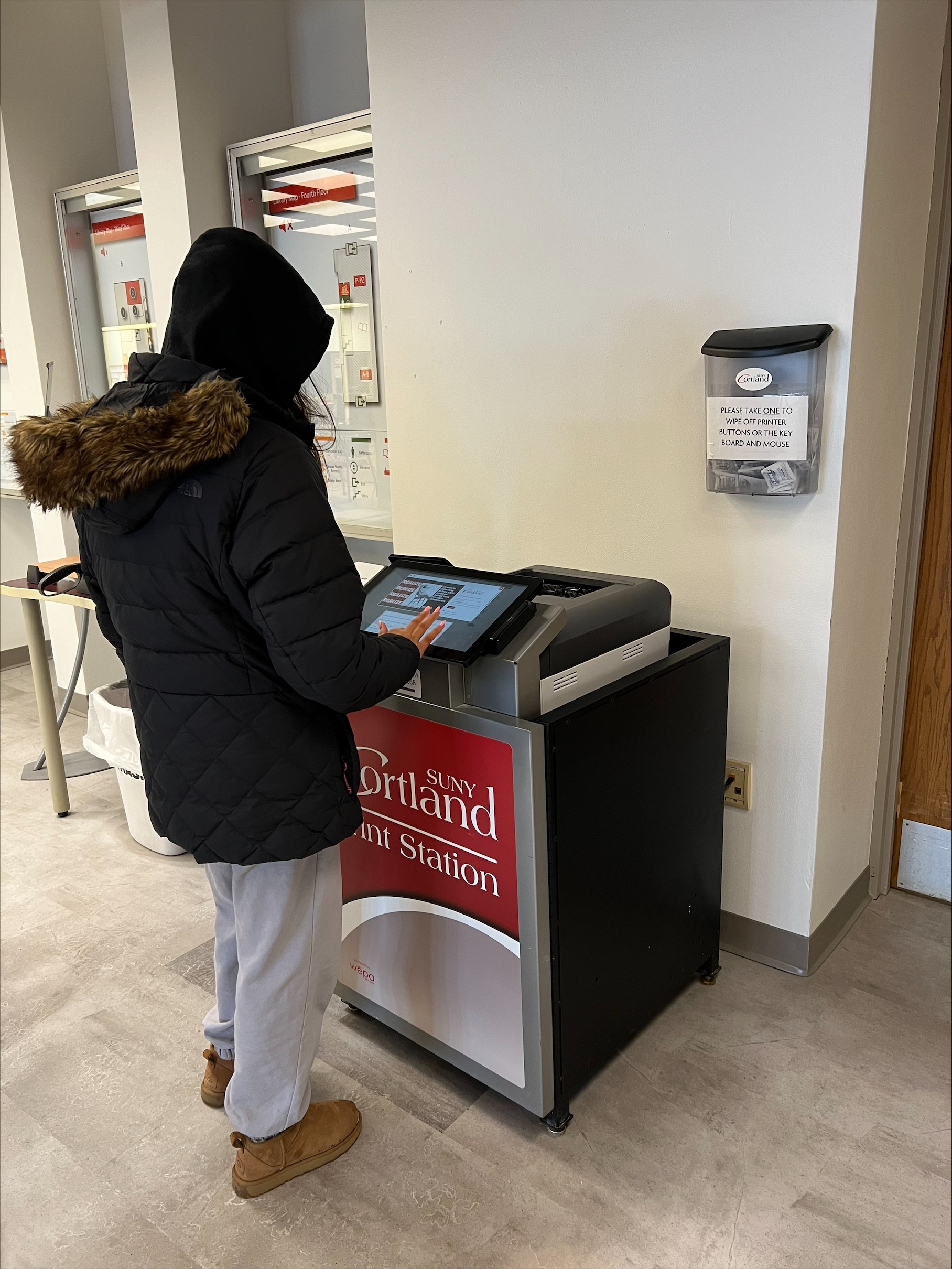Person using a WEPA print station